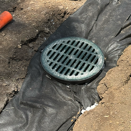 Fabric wrapped around catch basin